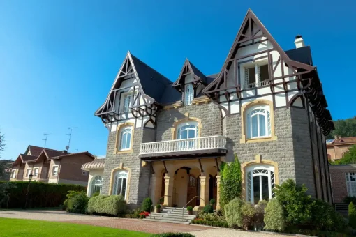 Hotel Villa Soro an old building with pointed gables and wood showing on the facade tudor style
