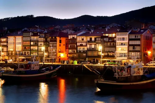 Harbour Lekeitio City - in the evening with street lights and some light in the sky